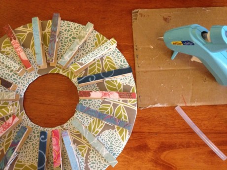 glueing pins to wreath