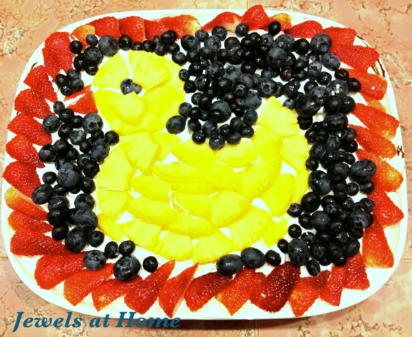 Ducky cake for baby shower.  Marble cake topped with whipped cream and fresh fruit.  Jewels at Home.