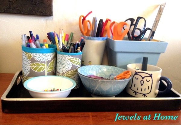 Craft room desk set: DIY pencil tins fit in with ceramics on a vintage tray. From Jewels at Home. Craft room desk set: DIY pencil tins fit in with ceramics on a vintage tray. From Jewels at Home.