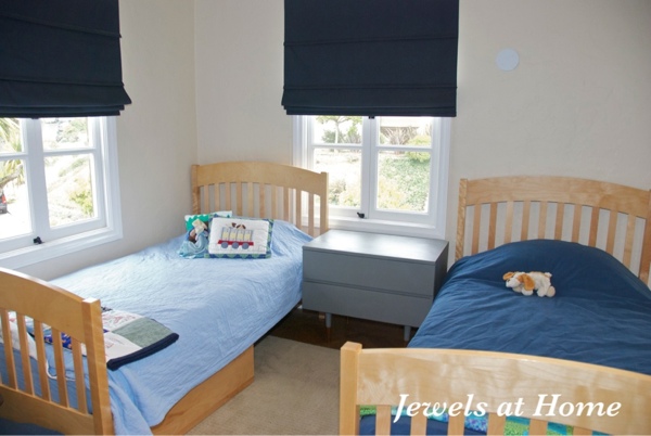 Boys' room with a painted Mid-Century nightstand.  From Jewels at Home.