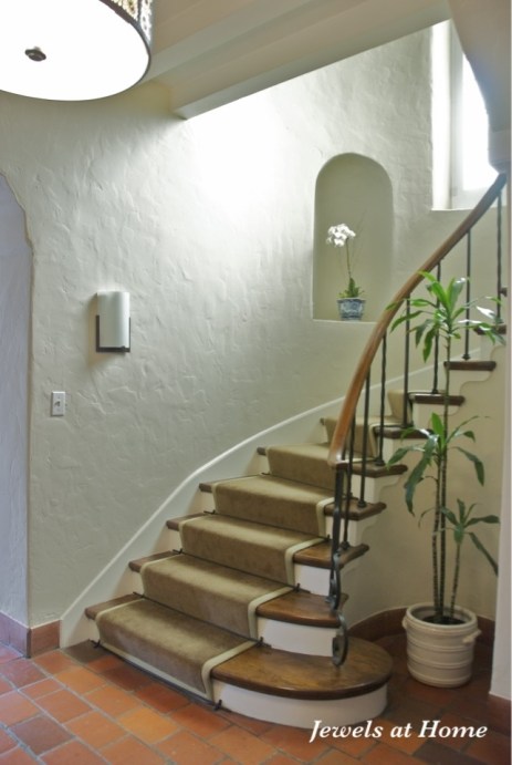 A classic stairway with a new look. Walls are Manchester Tan from Benjamin Moore. From Jewels at Home.