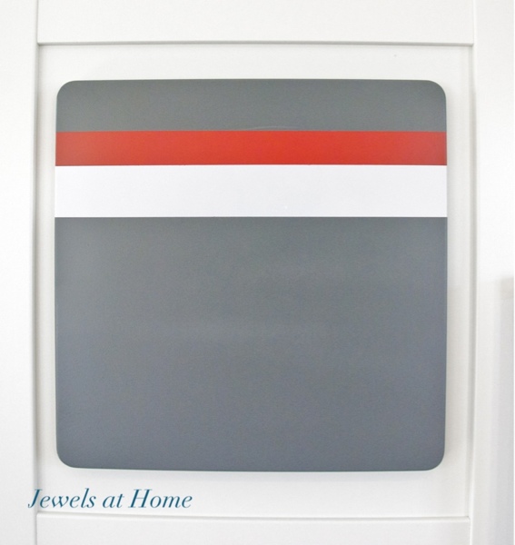 Magnet board with racing stripes.  Tutorial from Jewels at Home.