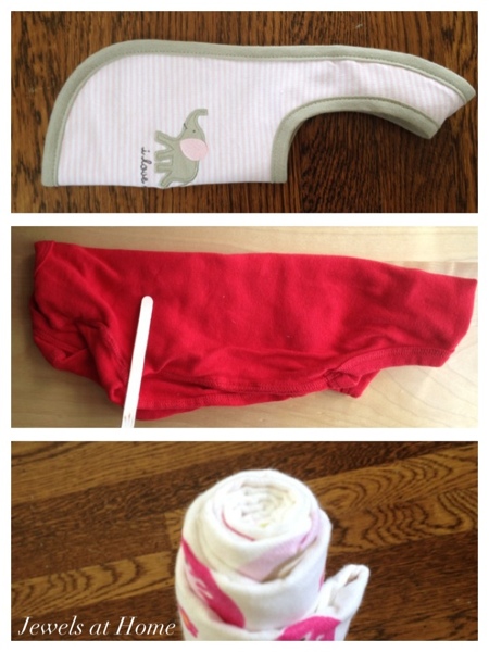 Rolling bibs, onesies, and receiving blankets to make flowers for a bouquet.  Jewels at Home.