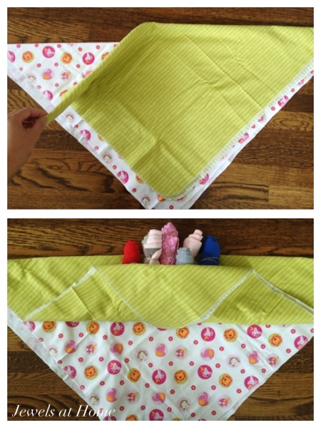 Wrapping bibs, onesies, and receiving blankets into a bouquet.  Jewels at Home.