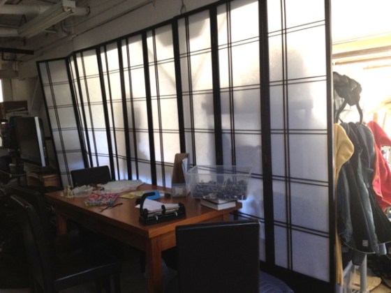 Shoji screens in extra-tall heights can be used to create a floor-to-ceiling room divider that lets light filter through.  Jewels at Home.