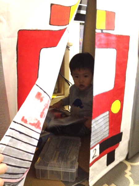 DIY cardboard fire station play house - it can be folded flat for storage.  Jewels at Home.  