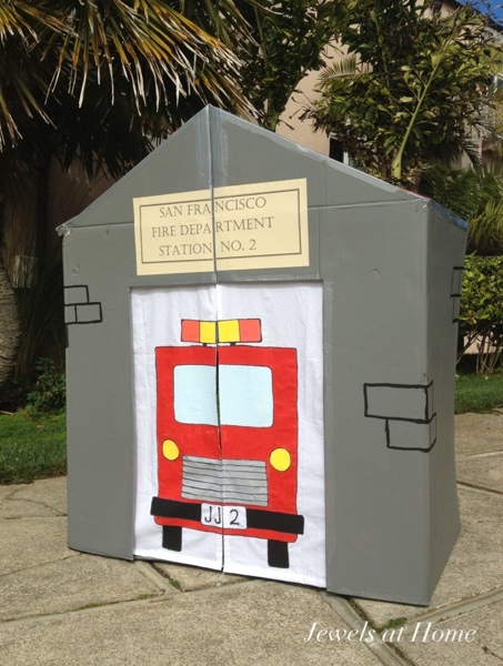 DIY cardboard fire station play house - it can be folded flat for storage.  Jewels at Home.  