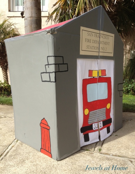 DIY cardboard fire station play house - it can be folded flat for storage.  Jewels at Home.  