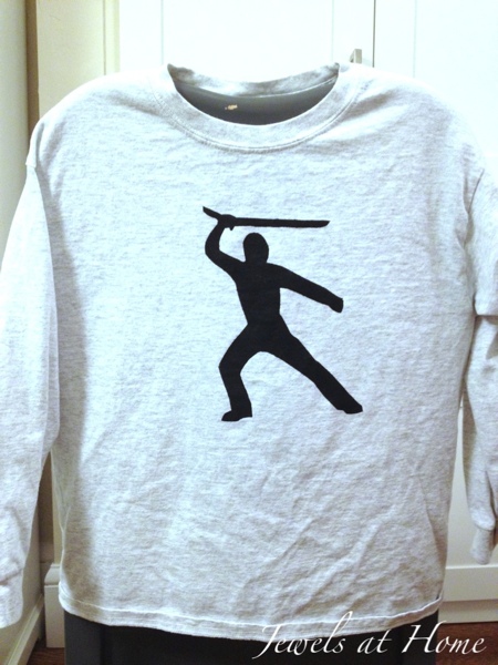 Stencil your own T-shirts with contact paper and fabric paint. Heat set the paint with an iron.  The ideas are endless.  These are for a boy's Ninjago birthday party.  {Jewels at Home}