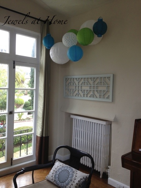 A collection of colorful paper lanterns brings the garden party inside.  {Jewels at Home}