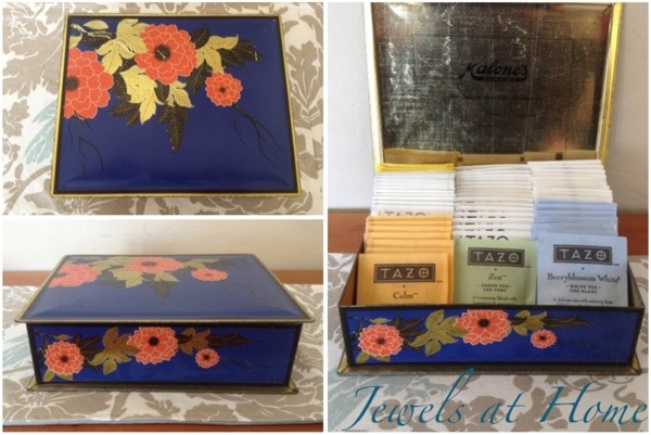 A vintage candy tin makes a perfect place to store and display tea bags.  Part of a vintage tea party from Jewels at Home.
