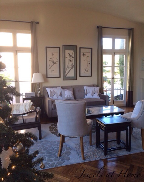 Holiday decorating.  Living room with new polar bear, snowy forest, and reindeer pillows for Christmas and the whole winter | Jewels at Home