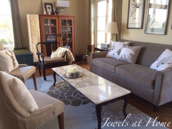 Holiday decorating.  Living room with new polar bear, snowy forest, and reindeer pillows for Christmas and the whole winter | Jewels at Home