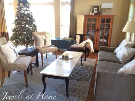 Holiday decorating.  Living room with new polar bear, snowy forest, and reindeer pillows for Christmas and the whole winter | Jewels at Home